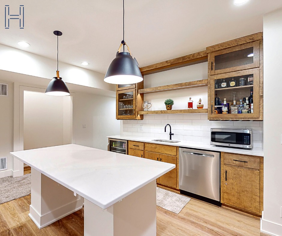 A basement kitchen with wood cabinets designed by hawthorne basements